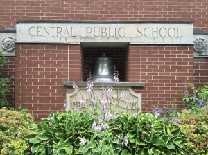 The bell and cornerstone from the old school